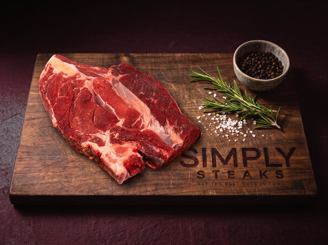Beef chuck roast joint on a Simply Steaks wooden board
