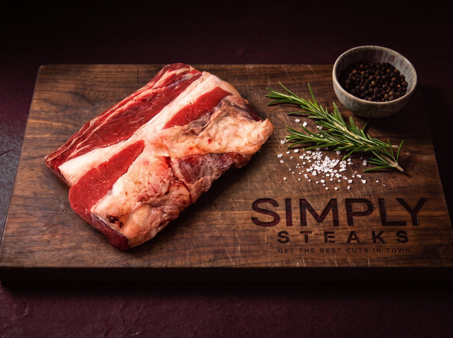 Raw beef brisket on a Simply Steaks wooden board