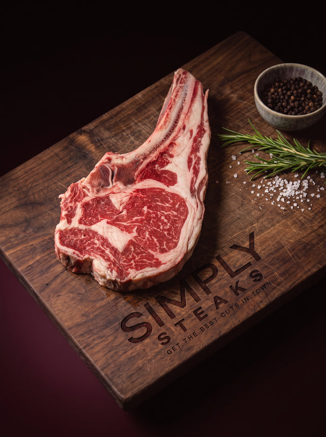 Cote de boeuf on a Simply Steaks wooden board with rosemary