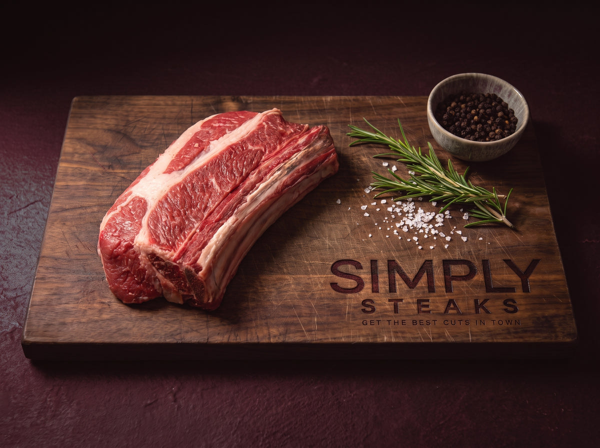 Raw beef short ribs on a Simply Steaks wooden board