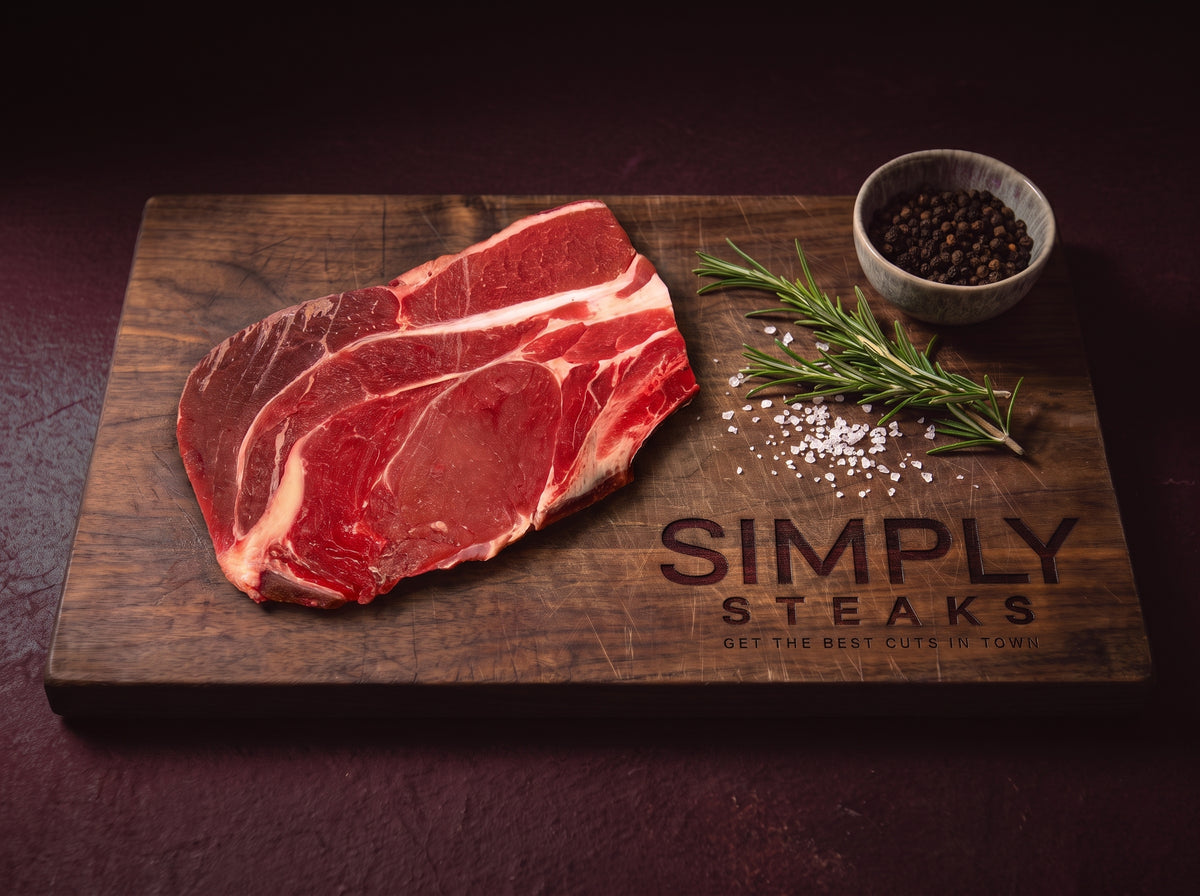 Beef chuck steak on a Simply Steaks wooden board
