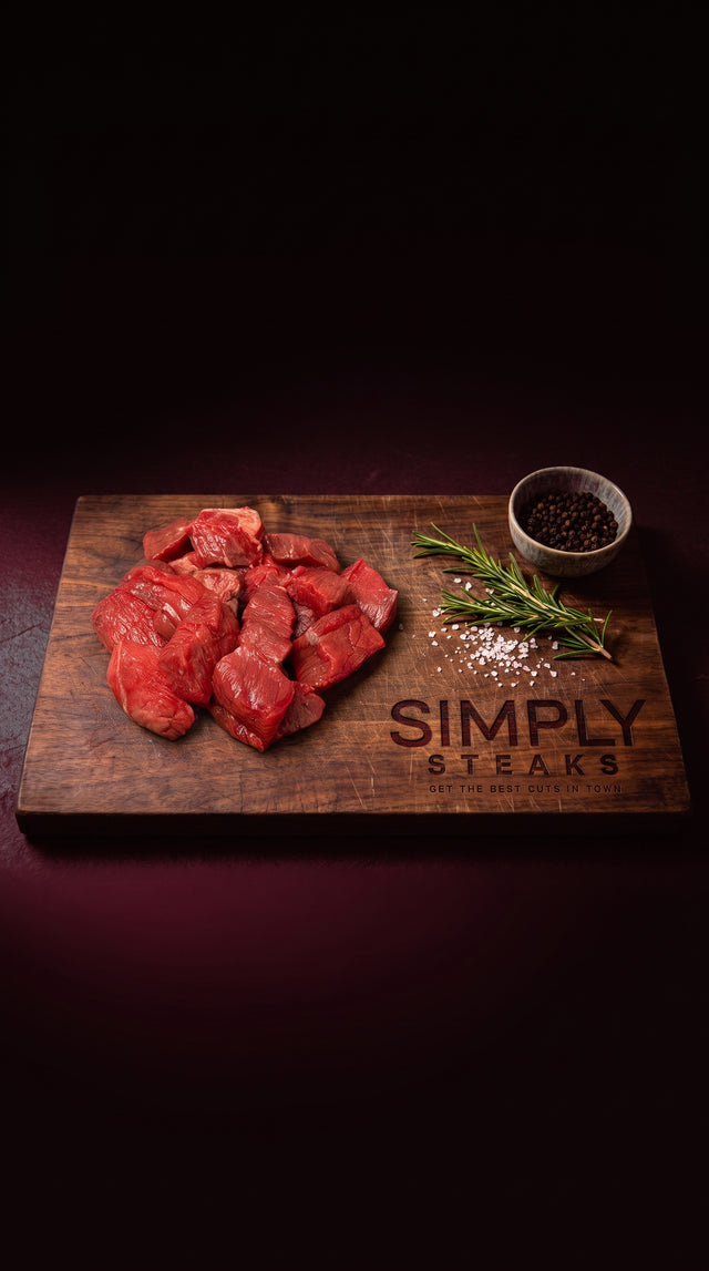 Diced boneless beef on a Simply Steaks wooden board
